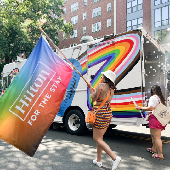Mobile branded food truck activation - NVS promo fleet. Pride parade vehicle