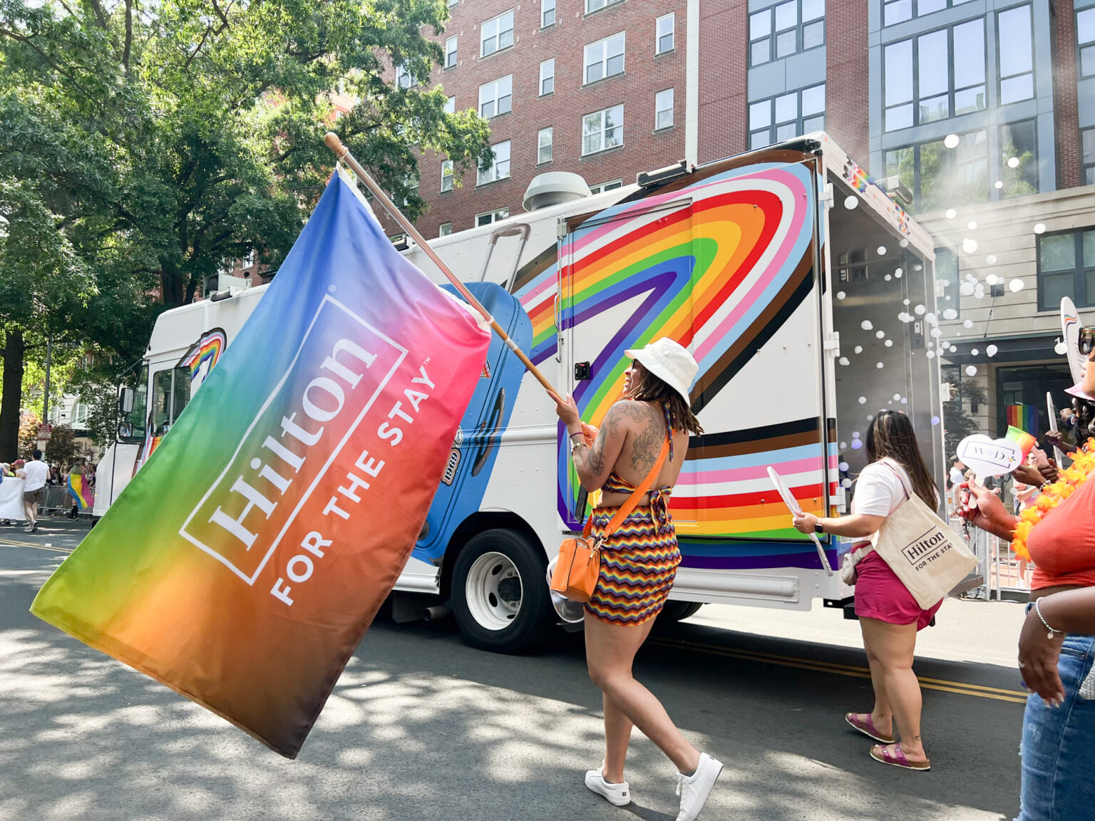 Mobile Tour Branded Food Truck Pride Event Hilton Mobile branded food truck activation - NVS promo fleet. Pride parade vehicle