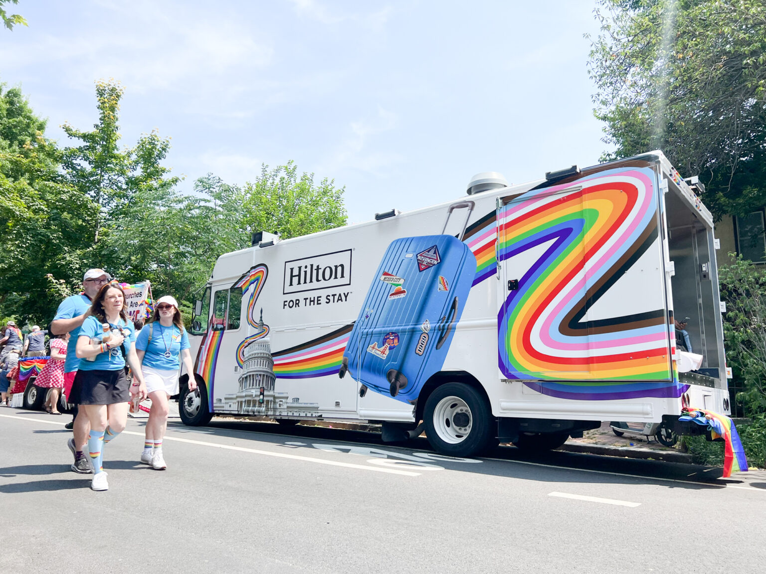 Mobile Tour Branded Food Truck Pride Event Hilton Mobile branded food truck activation - NVS promo fleet. Pride parade vehicle