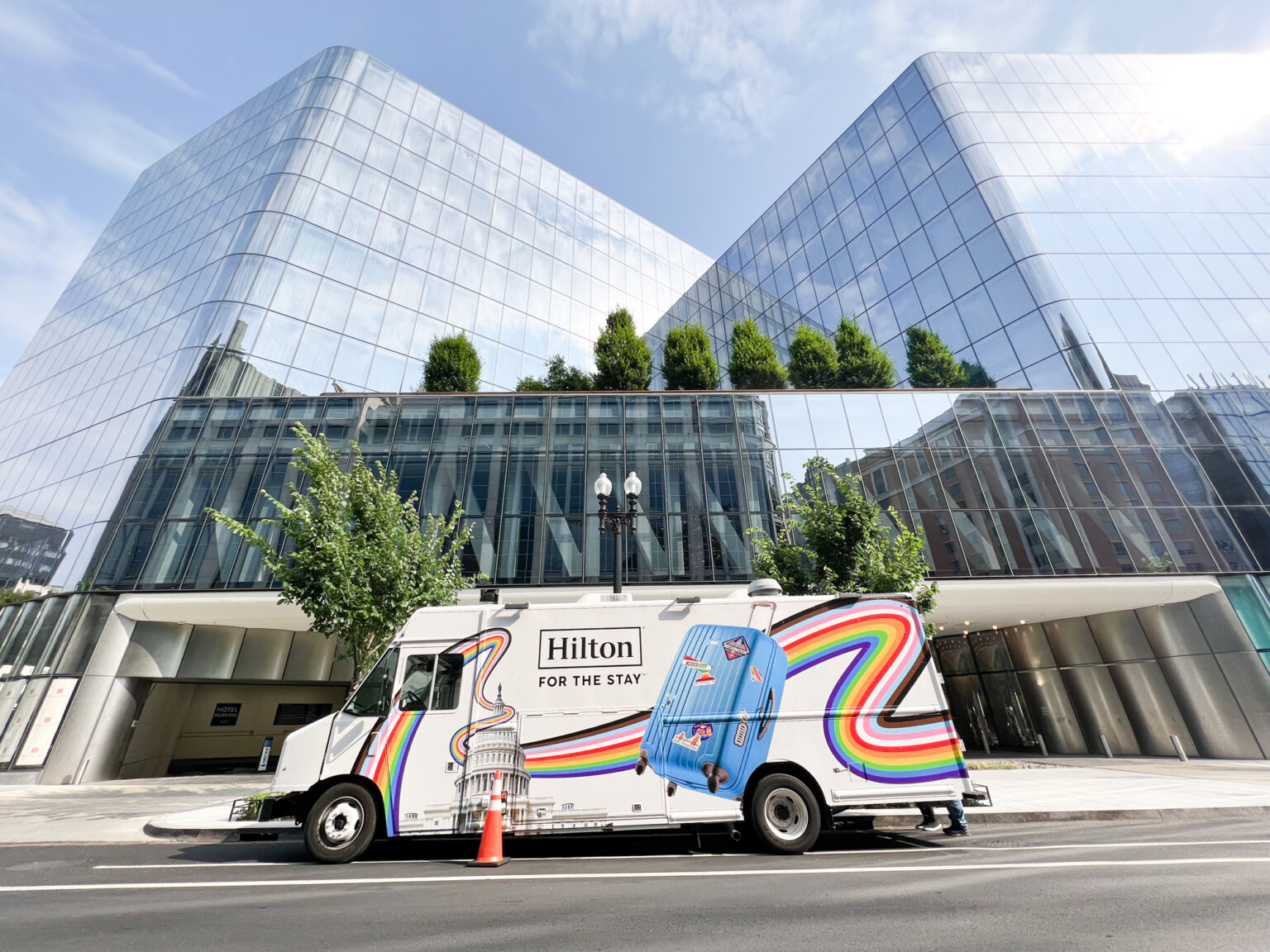 Mobile Tour Branded Food Truck Pride Event Hilton Mobile branded food truck activation - NVS promo fleet. Pride parade vehicle