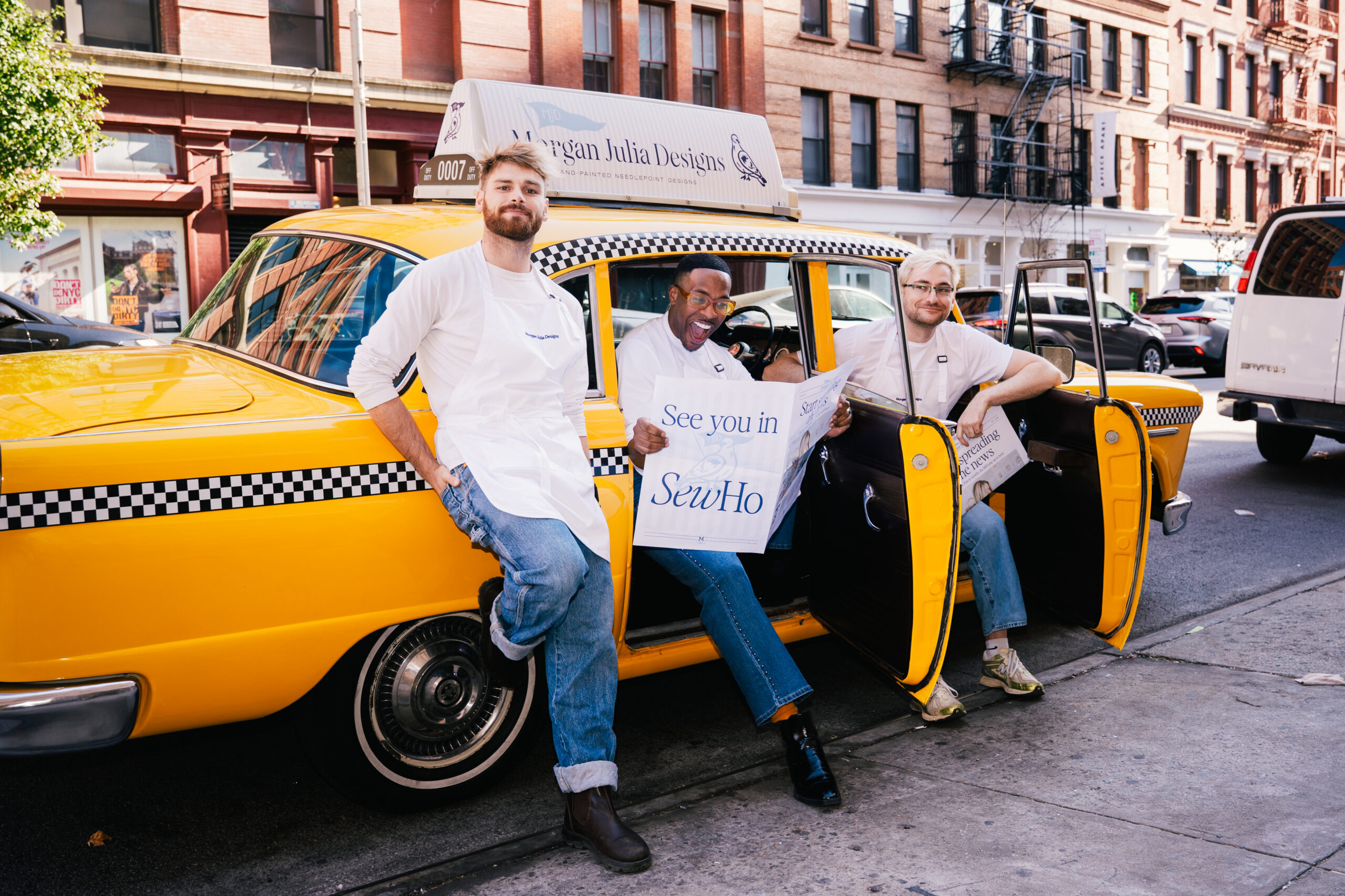Classic New York Checkered Cab converted into a branded experiential vehicle for retail and photo activations, wrapped and detailed in-house.