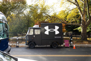 coffe-pop-up-ice-cream-nyc--30 Branded coffee truck activation for Under Armour during the NYC Marathon featuring matte black wrap, signage, and in-house fabrication by NVS Visuals.