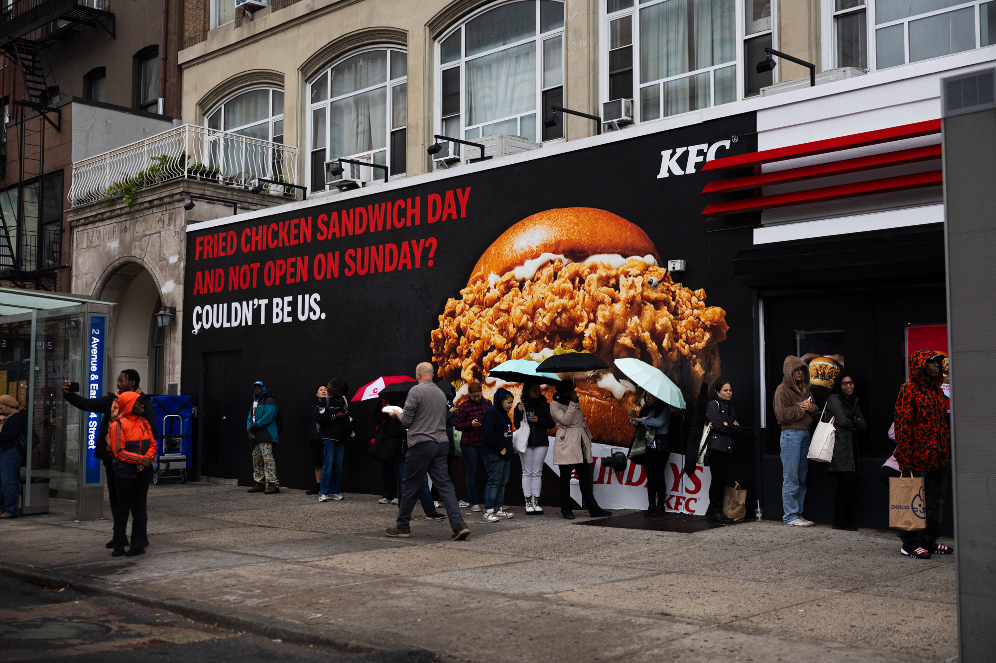 Branded pop up exterior transformation of KFC Sundays featuring 36-foot mural and LED marquee by NVS Visuals.