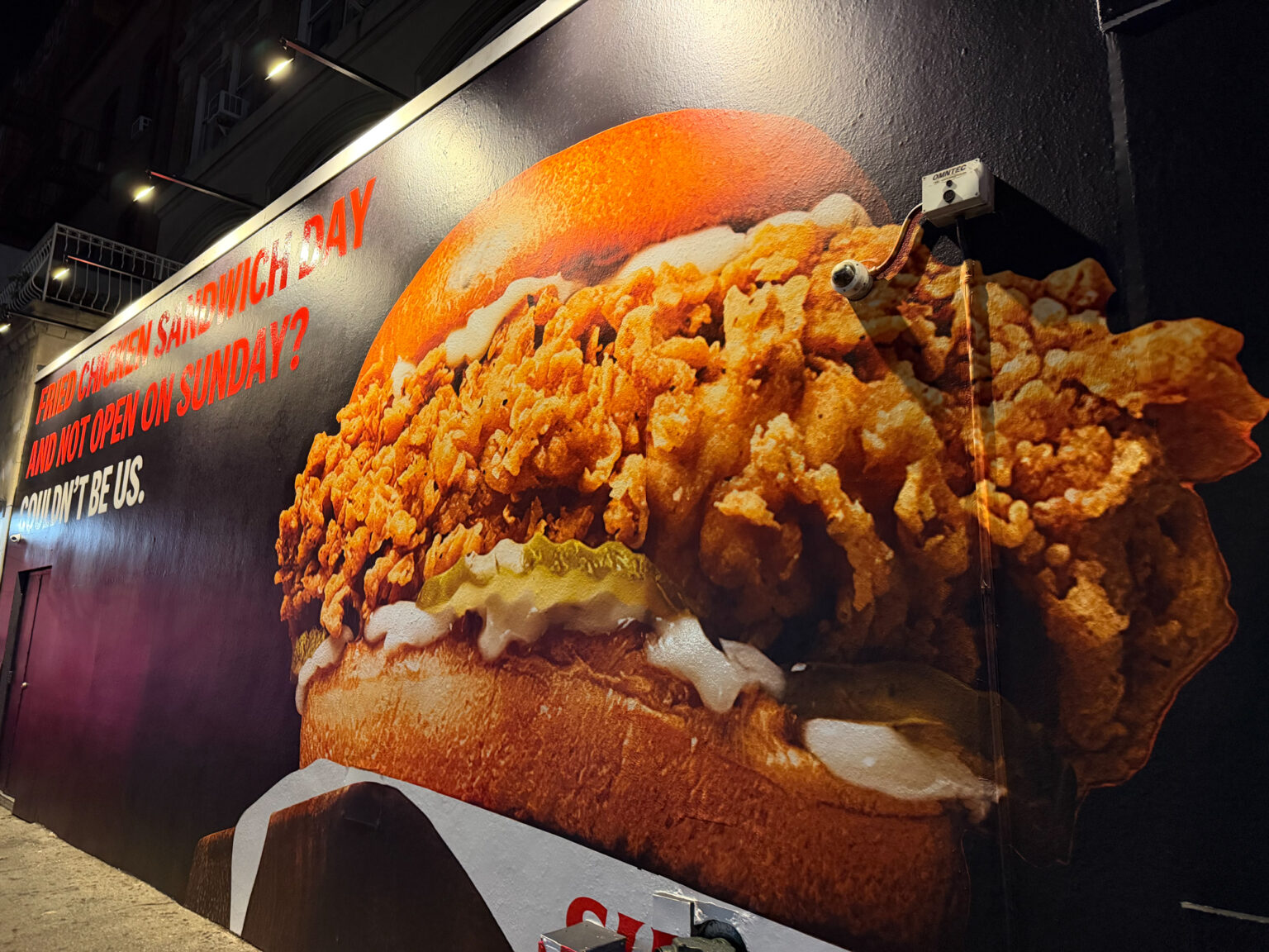 kfc-sundays-pop-up-nyc-brand-takeover-activation-13 Billboard-inspired photo activation with custom bench and 8' × 10' LED wall for the KFC Sundays pop up.