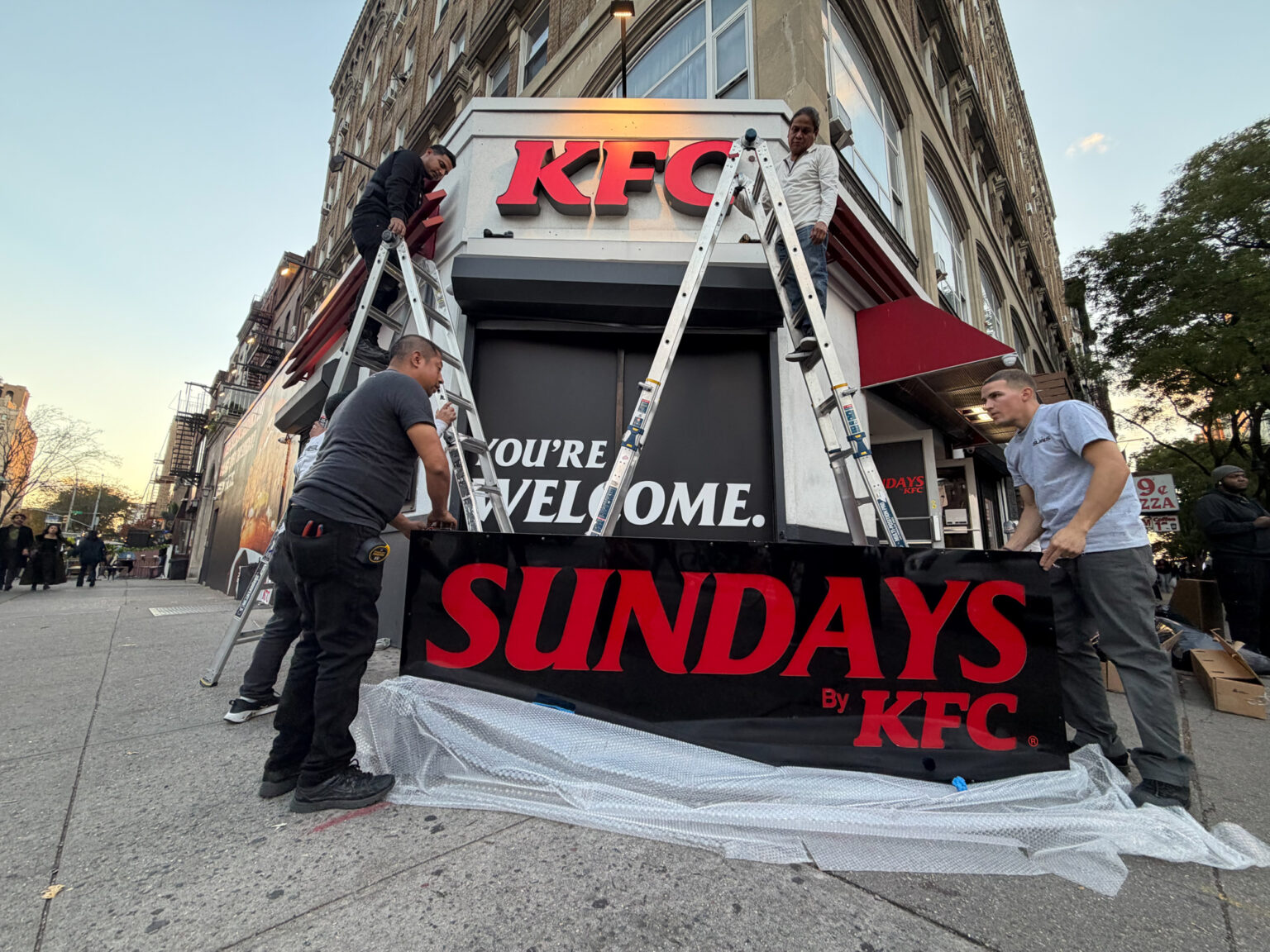 Kfc Sundays Pop Up Nyc Brand Takeover Activation Interior brand takeover pop up with custom grasscloth wallpaper, LED frames, and scenic flats fabricated by NVS Visuals. fabrication, video wall, light boxes and vinyl