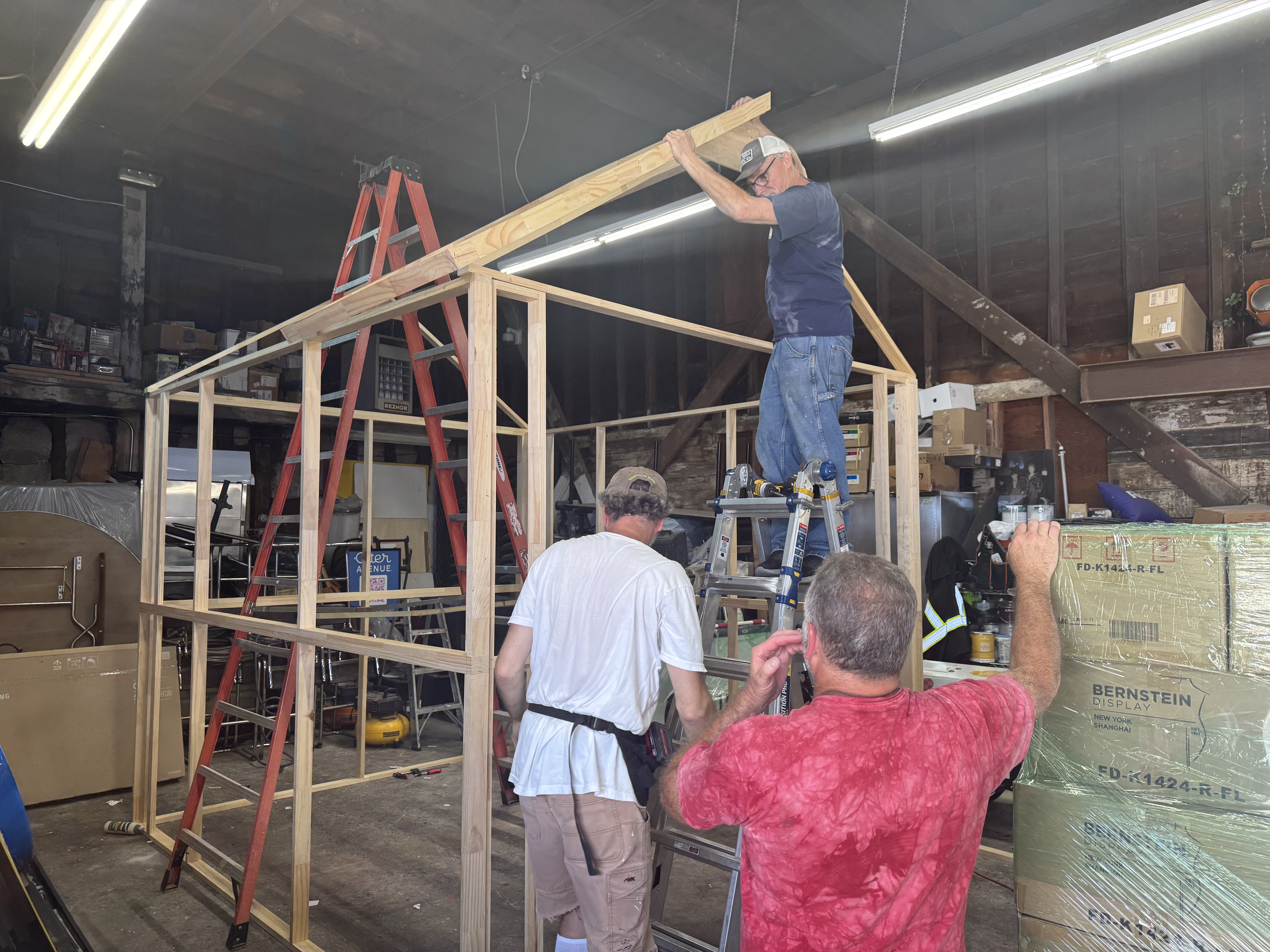 Popup Fabrication Shop Floor House Frame Pop-up fabrication shop floor — wooden structural frame being built at NVS Visuals