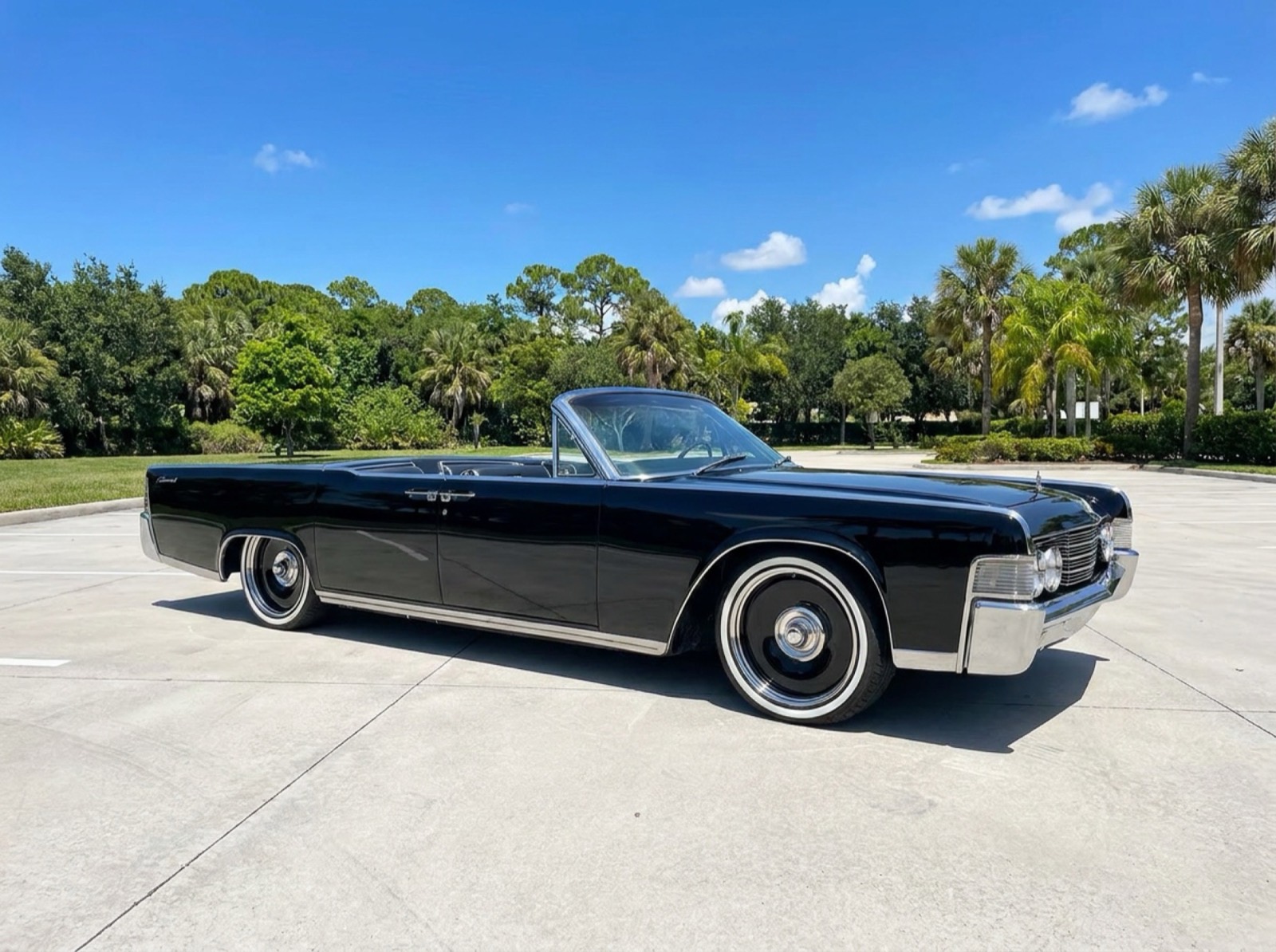 1964 Lincoln Continental Side Profile 1964 Lincoln Continental convertible clean black side profile, top down, pre-branding