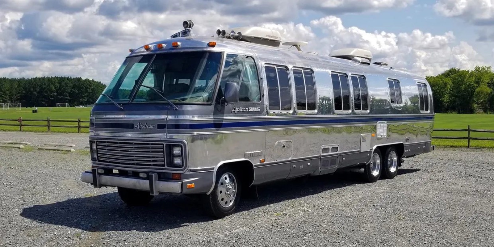1984 Airstream RV — front, pre-branding Polished 1984 Airstream RV front three-quarter view, unbranded