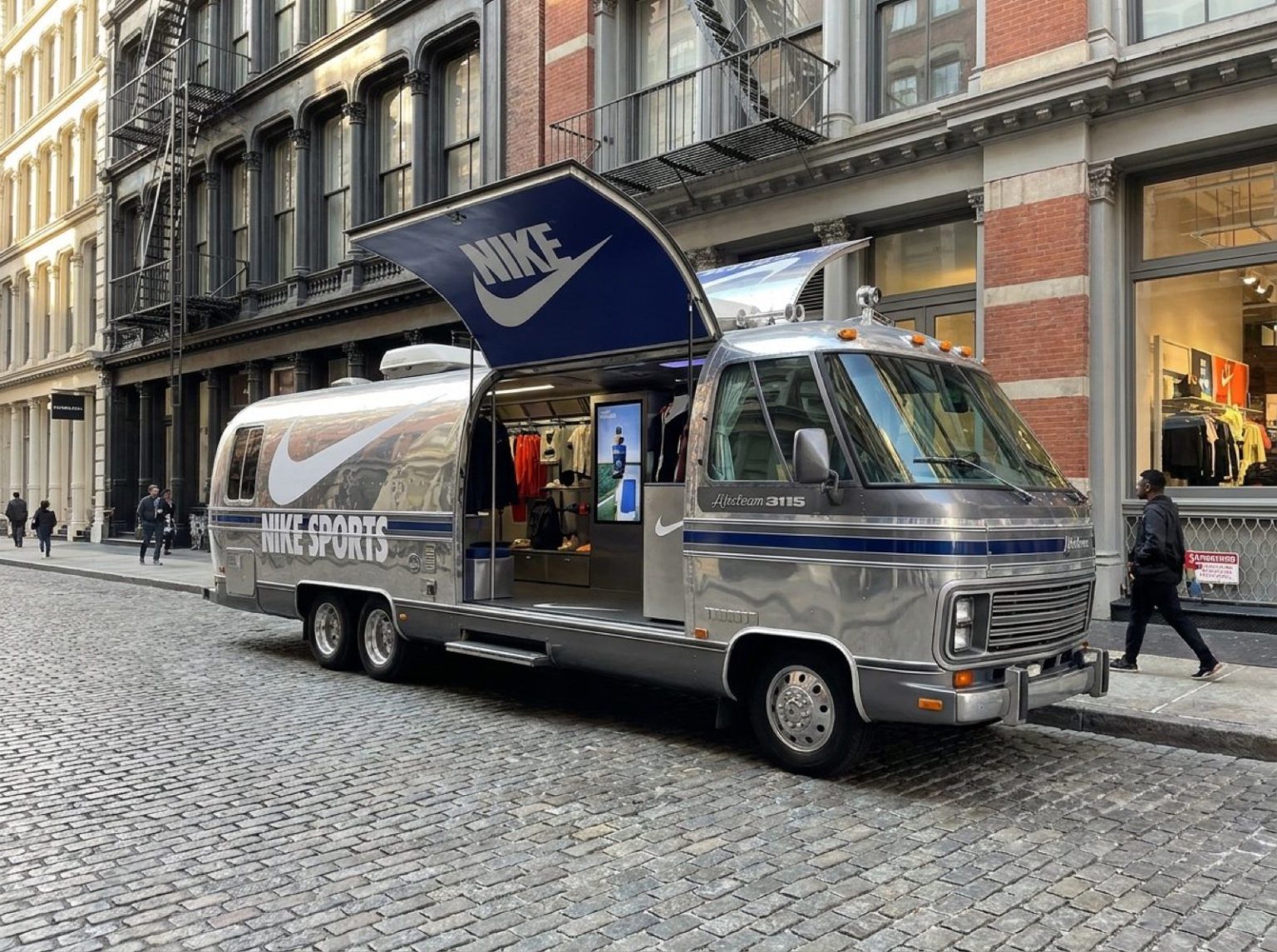 1984 Airstream Rv Sports Retail Concept Concept render of Airstream RV wrapped as a sports retail pop-up in SoHo with branded awning