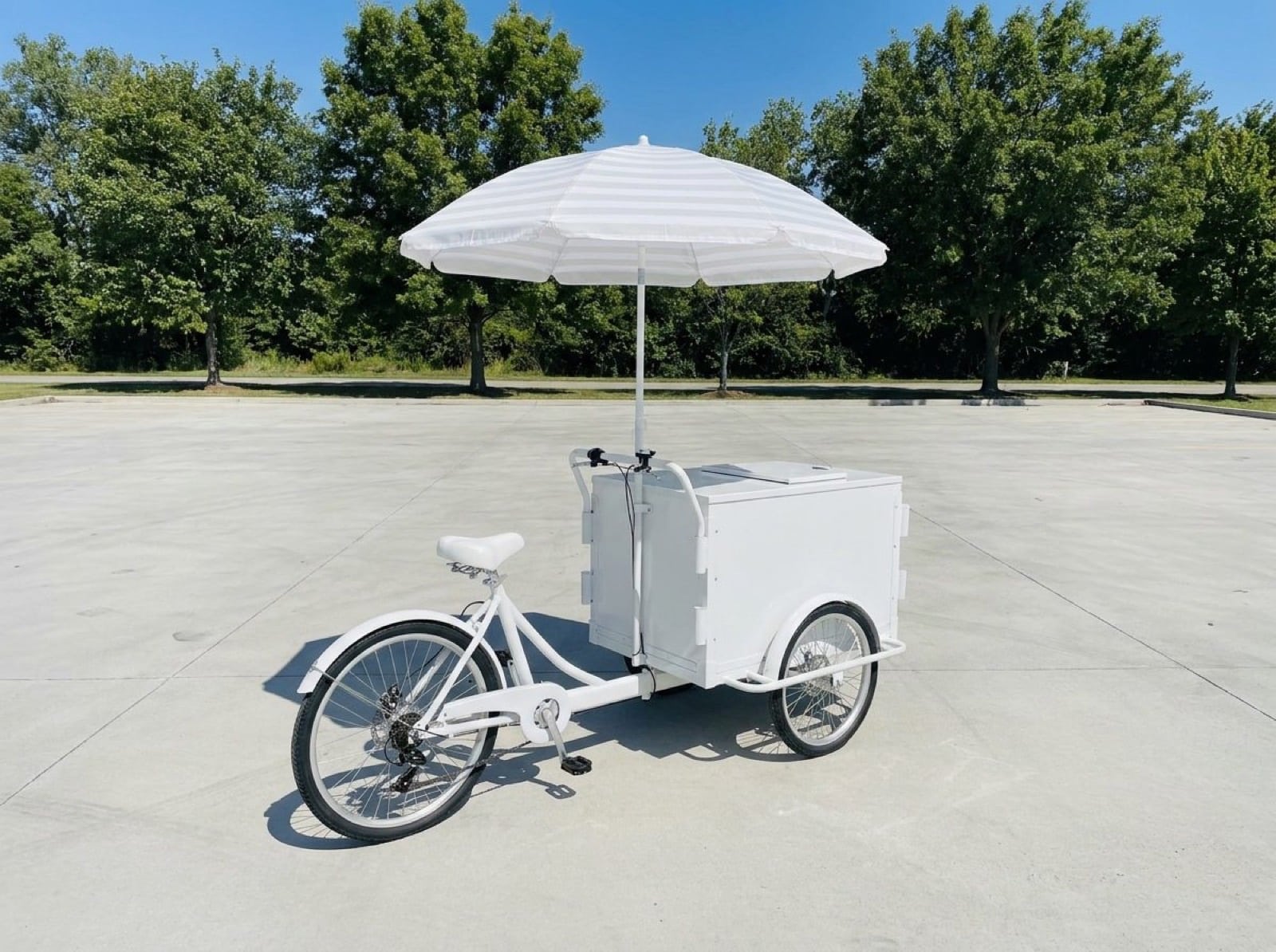 branded-tricycle-sampling-cart Three-wheeled branded tricycle sampling cart with refrigerated front box — NVS Visuals