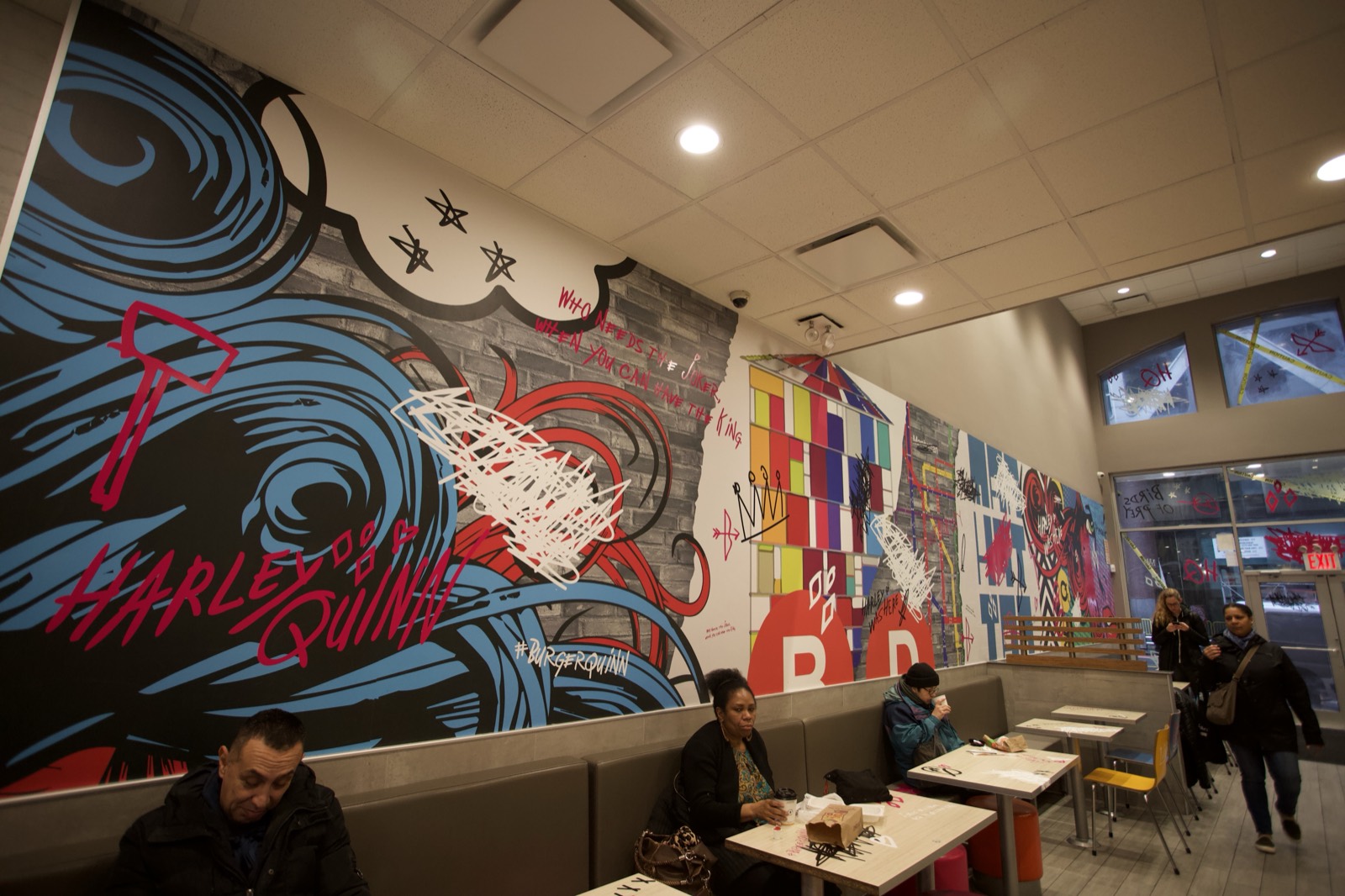 burger-king-burger-quinn-restaurant-takeover Burger King 'Burger Quinn' movie-release takeover for the 2020 Harley Quinn film — full-interior themed wall graphics