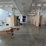 CARE Package Anniversary pop-up fabrication and installation in progress, photo 04