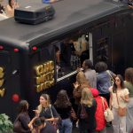 Guests line up at the Club Dirty Brew bar truck for Belvedere coffee vodka cocktails