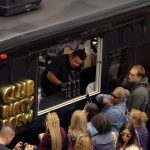 Bartenders serving Belvedere Dirty Brew drinks from the truck window
