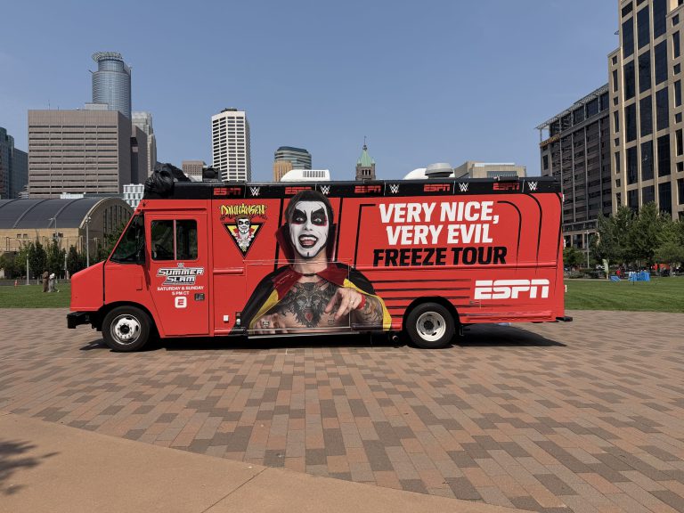 Full side view of the ESPN x WWE Danhausen Freeze Tour food truck wrapped by NVS Visuals, downtown Minneapolis
