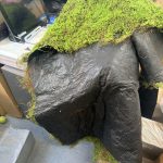 Preserved moss applied over a sculpted and painted foam rock, Tatcha experiential fabrication