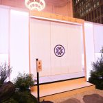 Tatcha tea pavilion entry step and door with Tatcha crest, Grand Central Terminal