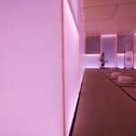 Interior of the Tatcha tea room with glowing architectural film plexiglass walls