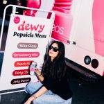 Guest at the Dewy popsicle menu on the eos truck