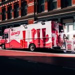 Guests lined up at the eos x NYLON Dewy truck on Broadway