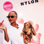 Guest with her dog at the eos x NYLON photo wall