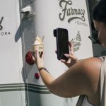 Guest filming her Farmacy froyo against the truck
