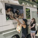 Guests at the Farmacy truck serving window