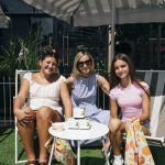 Guests relaxing in the Farmacy lawn lounge