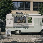 Farmacy x Sephora froyo truck with scalloped awning in Chelsea, New York