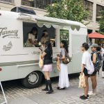 Full side wrap of the Farmacy truck with guests in line