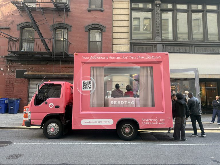Seedtag living room glass truck with robot family during Advertising Week New York